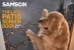 Golden retriever leaning on Samson Patio Door screen with rock and cement patio in background